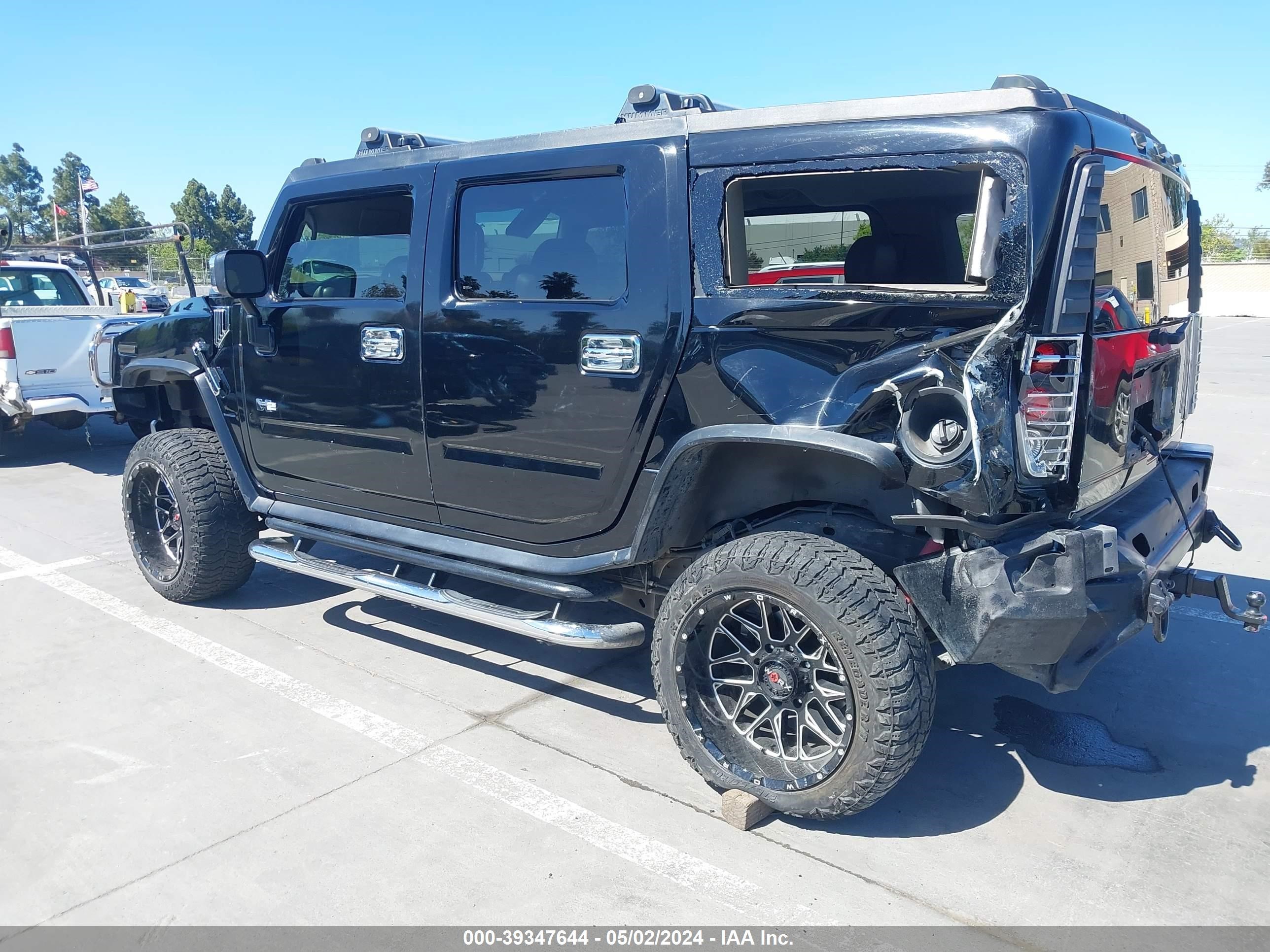 Photo 2 VIN: 5GRGN23UX3H131404 - HUMMER H2 