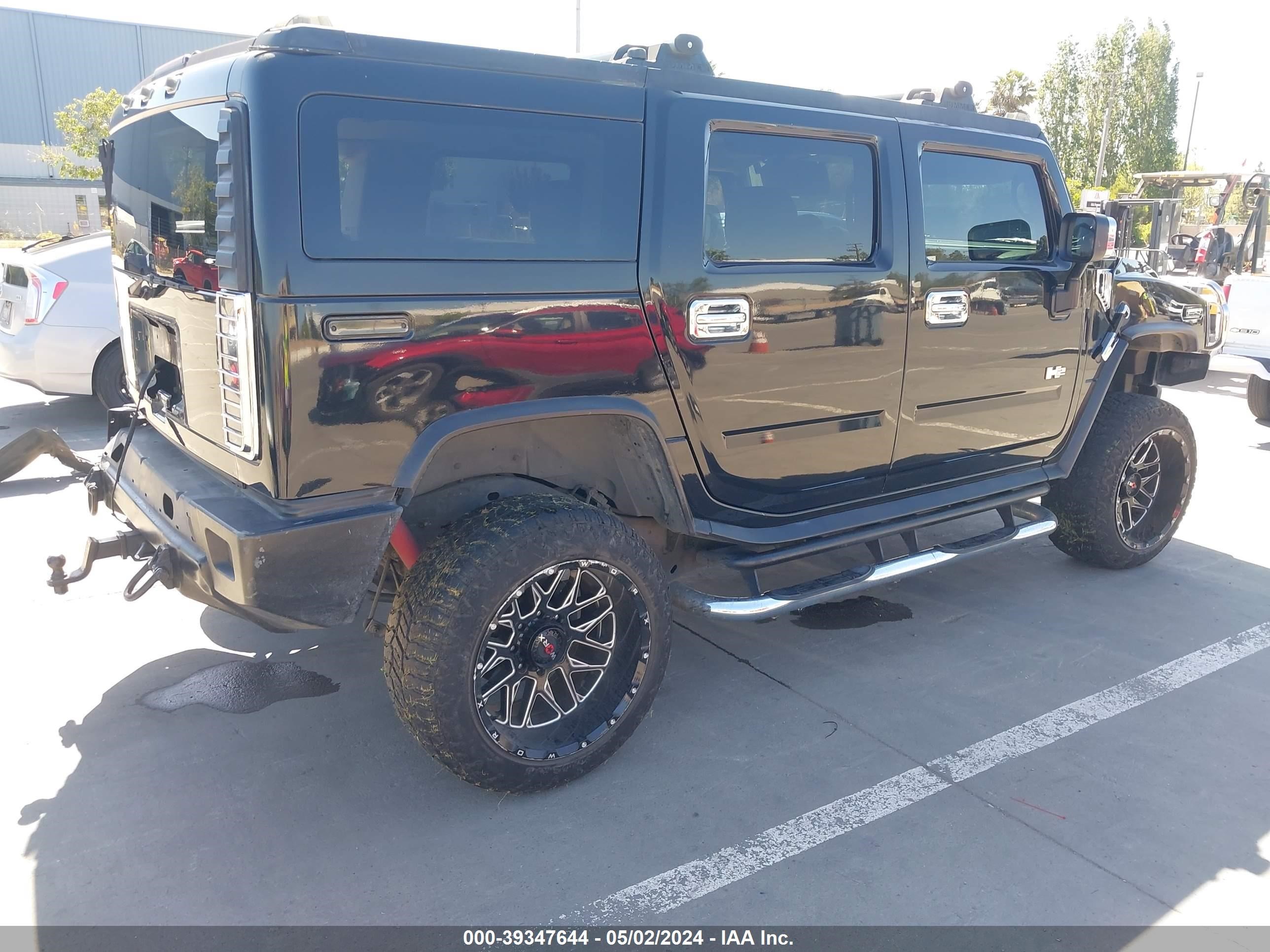 Photo 3 VIN: 5GRGN23UX3H131404 - HUMMER H2 