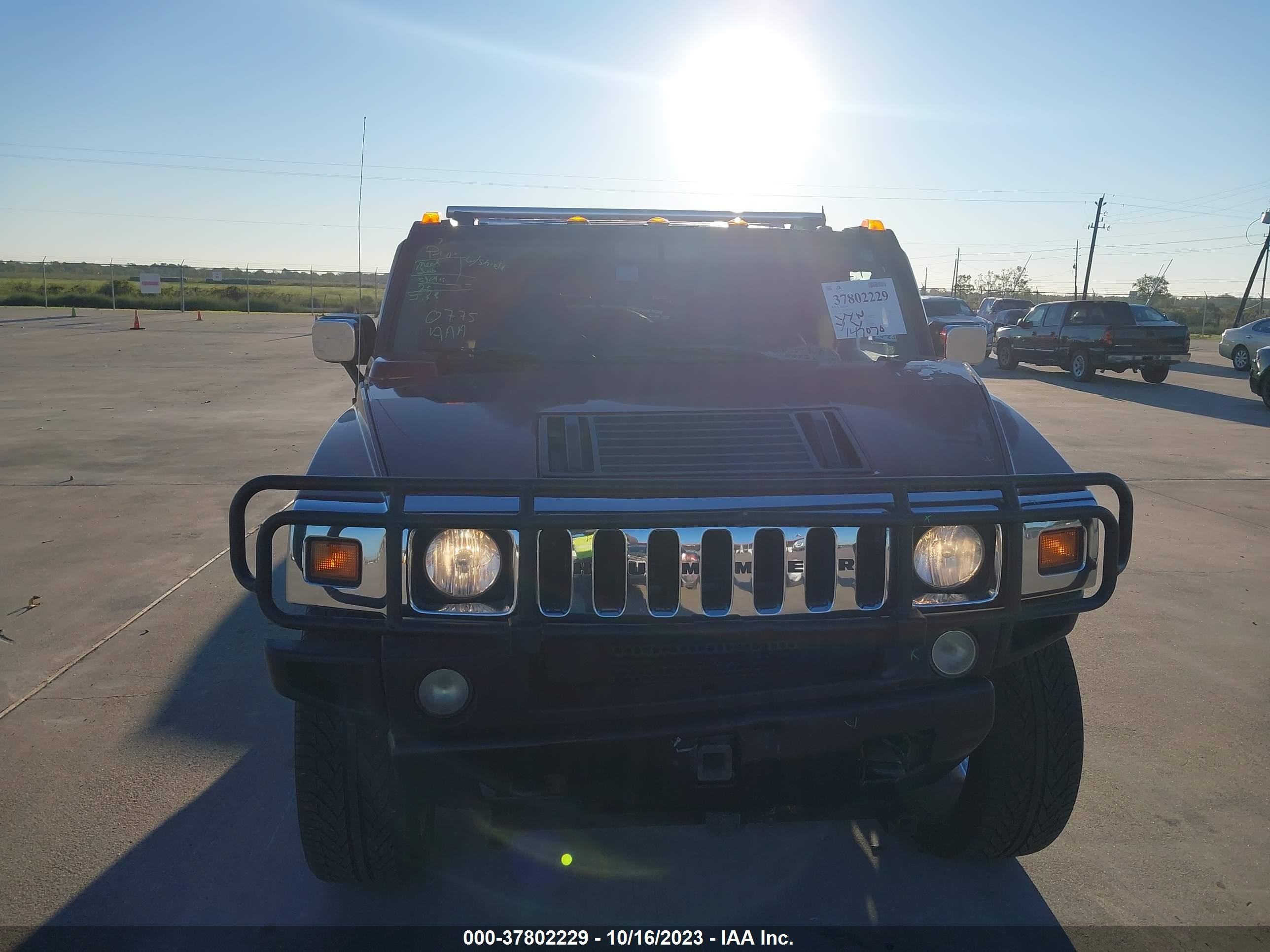 Photo 11 VIN: 5GRGN23UX4H106147 - HUMMER H2 