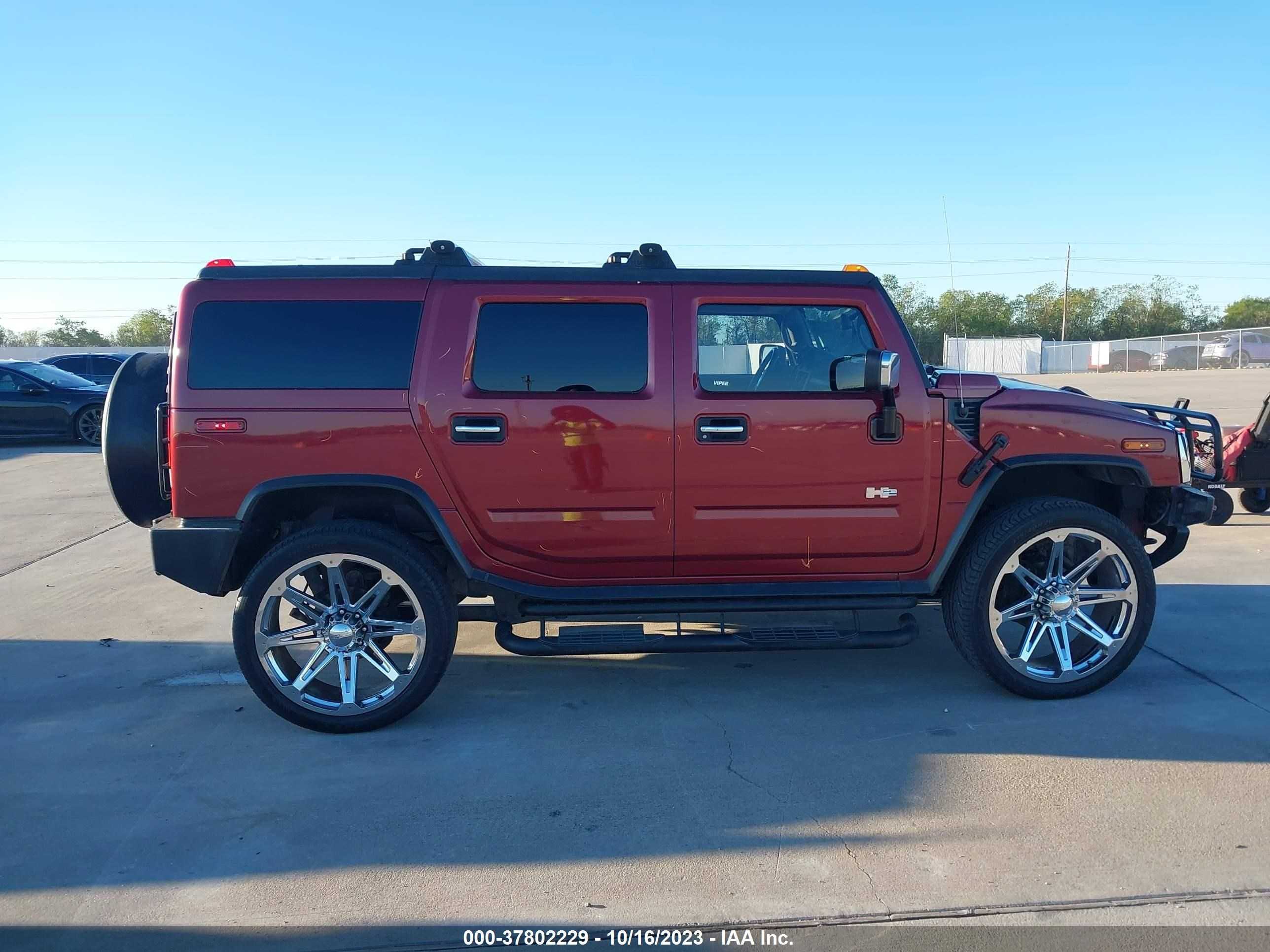 Photo 12 VIN: 5GRGN23UX4H106147 - HUMMER H2 