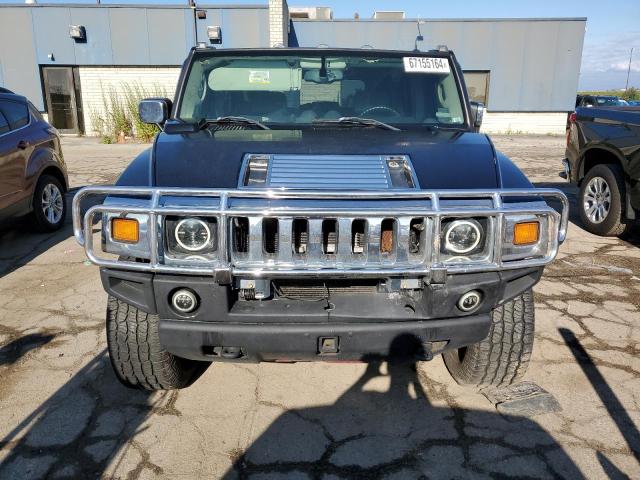 Photo 4 VIN: 5GRGN23UX4H120677 - HUMMER H2 