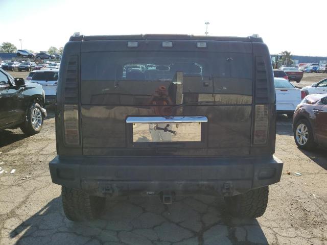 Photo 5 VIN: 5GRGN23UX4H120677 - HUMMER H2 