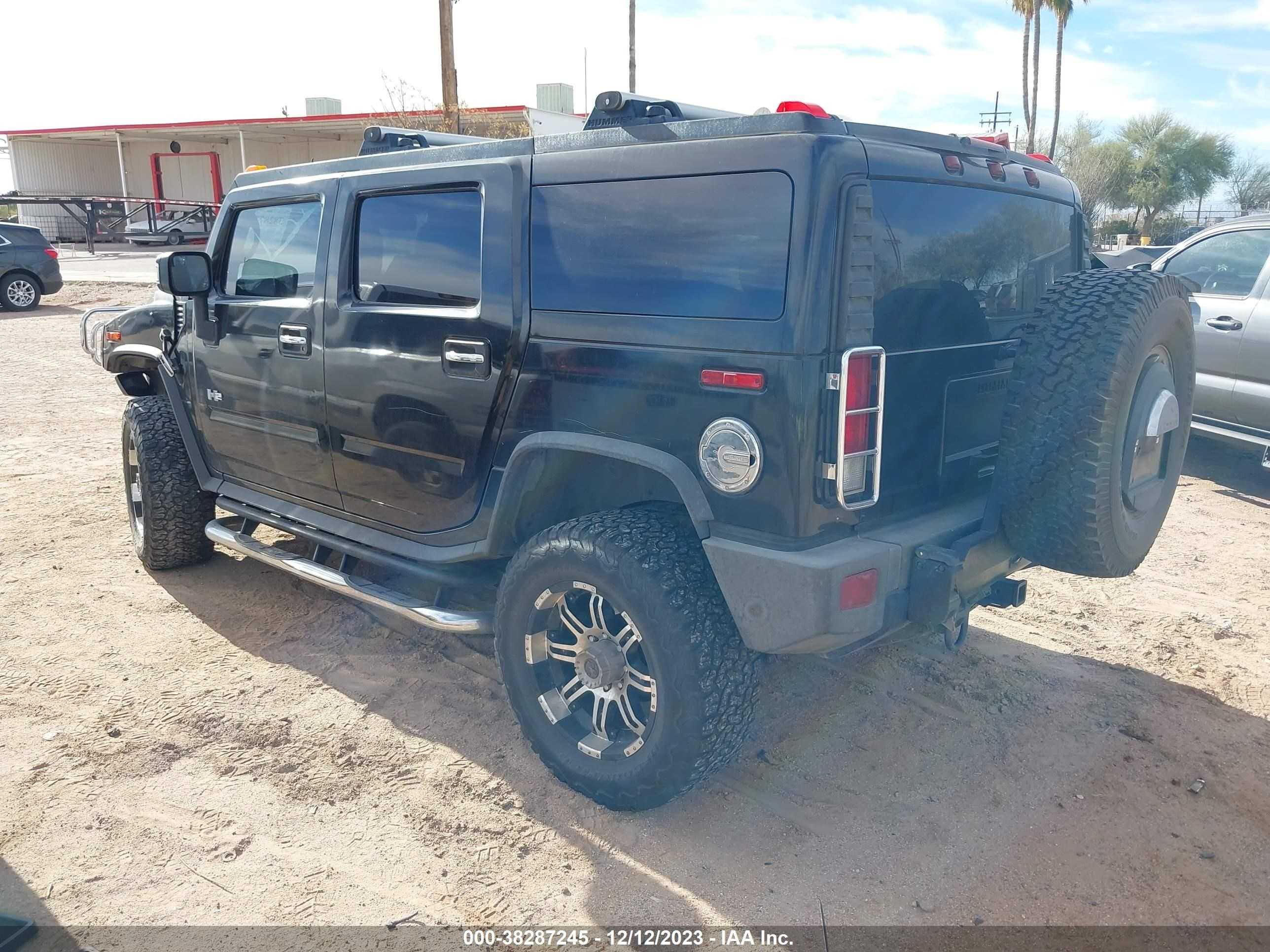 Photo 2 VIN: 5GRGN23UX7H108596 - HUMMER H2 