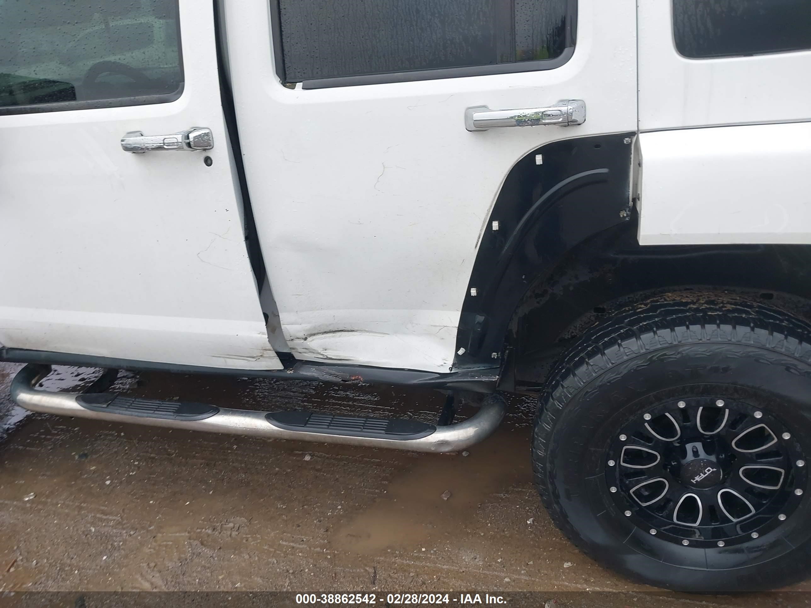 Photo 11 VIN: 5GTDN13EX78227698 - HUMMER NULL 