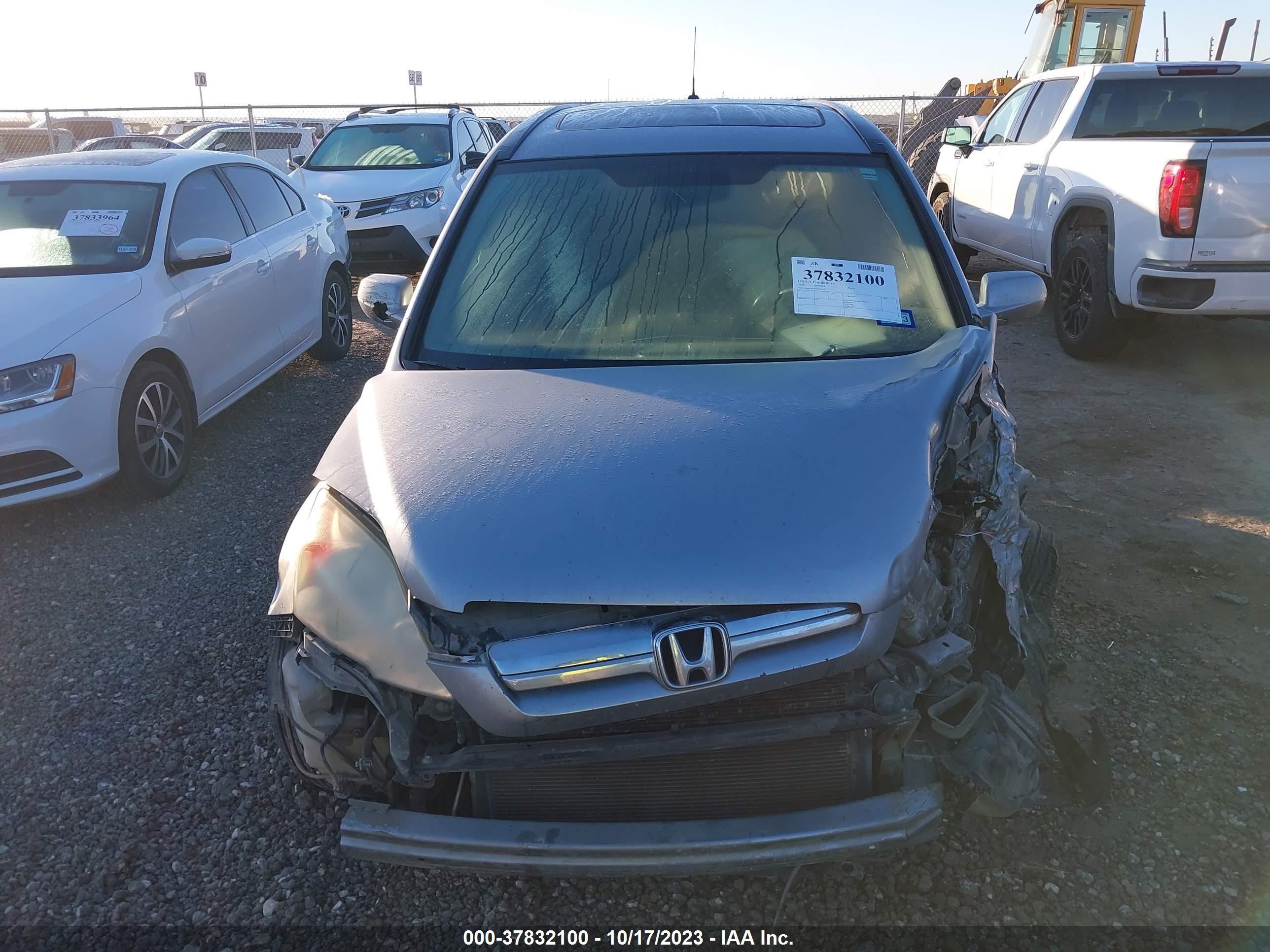 Photo 11 VIN: 5J6RE38738L003555 - HONDA CR-V 