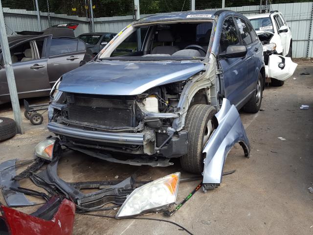 Photo 1 VIN: 5J6RE3H31AL003282 - HONDA CR-V LX 