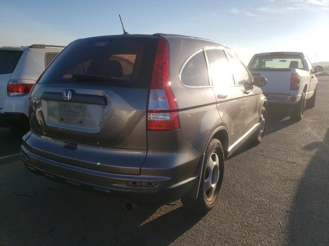 Photo 3 VIN: 5J6RE3H32AL038610 - HONDA CR-V LX 