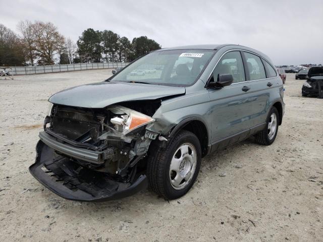 Photo 1 VIN: 5J6RE3H35AL048029 - HONDA CR-V LX 