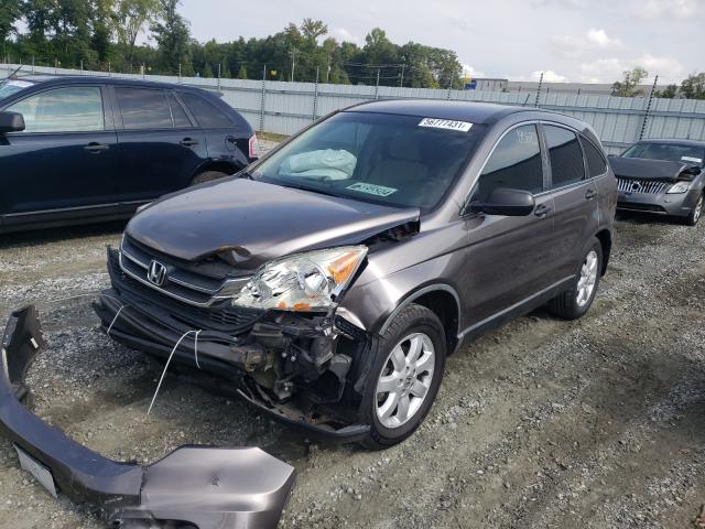 Photo 1 VIN: 5J6RE3H4XBL038168 - HONDA CR-V SE 