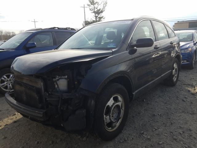 Photo 1 VIN: 5J6RE4H35AL068366 - HONDA CR-V LX 