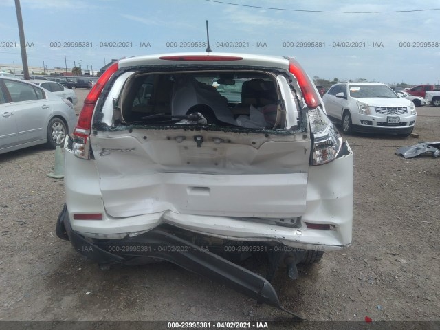 Photo 5 VIN: 5J6RM3H39GL030791 - HONDA CR-V 