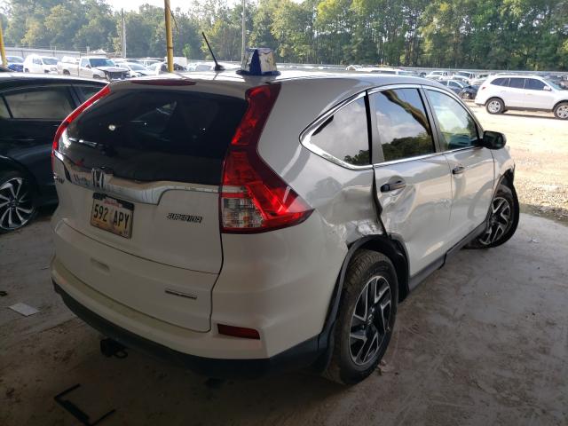 Photo 3 VIN: 5J6RM3H47GL007325 - HONDA CR-V SE 