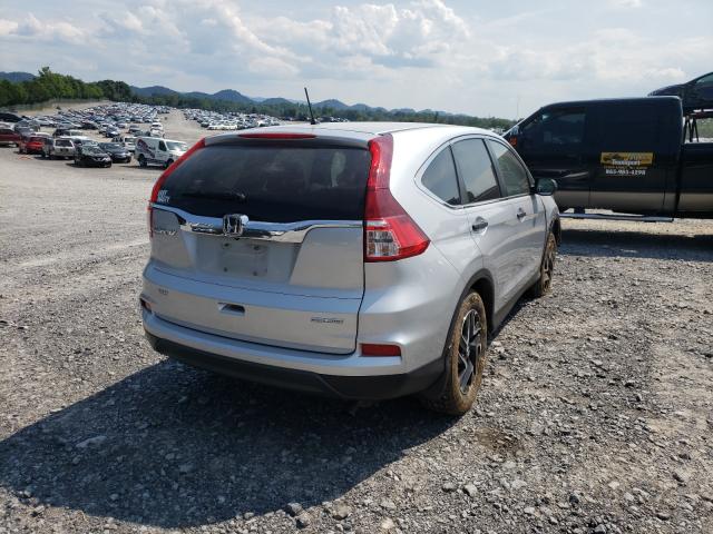 Photo 3 VIN: 5J6RM3H4XGL021171 - HONDA CR-V SE 