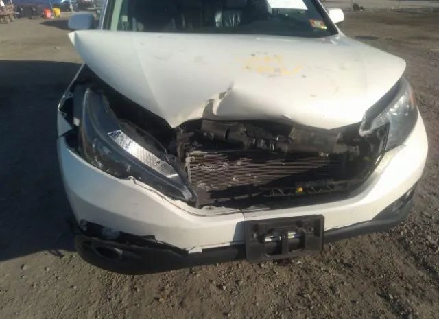 Photo 5 VIN: 5J6RM3H78EL033892 - HONDA CR-V 