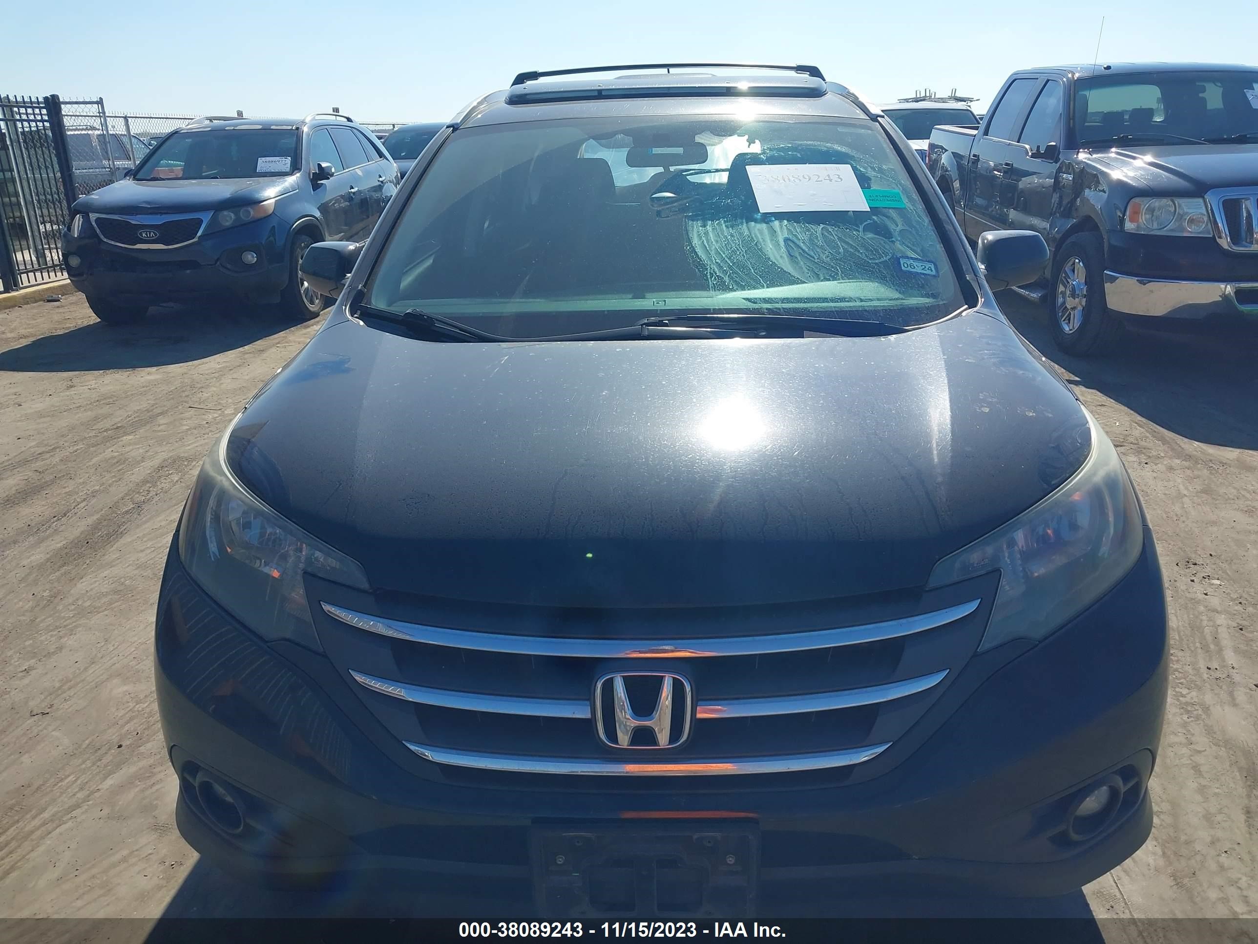 Photo 11 VIN: 5J6RM3H79CL001515 - HONDA CR-V 