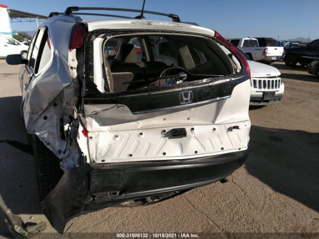 Photo 5 VIN: 5J6RM3H79EL000903 - HONDA CR-V 