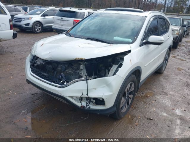 Photo 5 VIN: 5J6RM3H95GL016228 - HONDA CR-V 