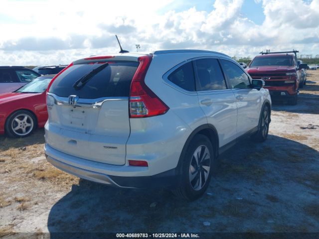 Photo 3 VIN: 5J6RM3H97GL028204 - HONDA CR-V 