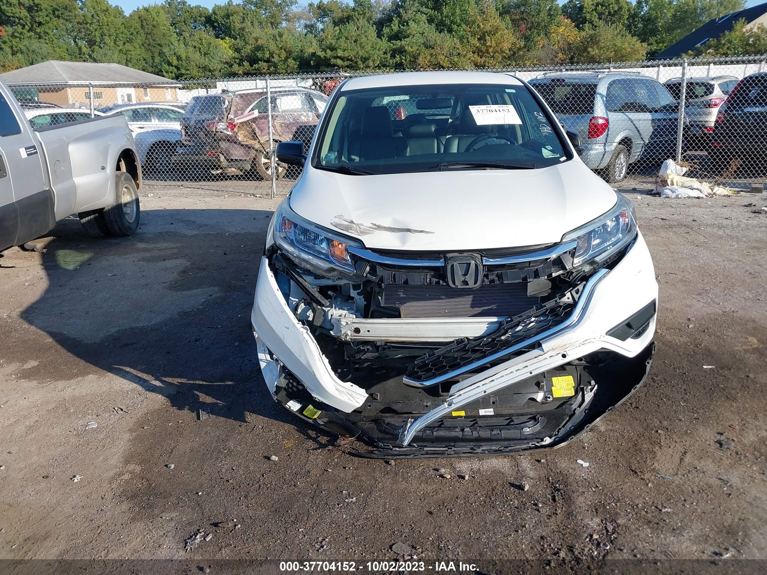 Photo 11 VIN: 5J6RM4H3XGL056273 - HONDA CR-V 