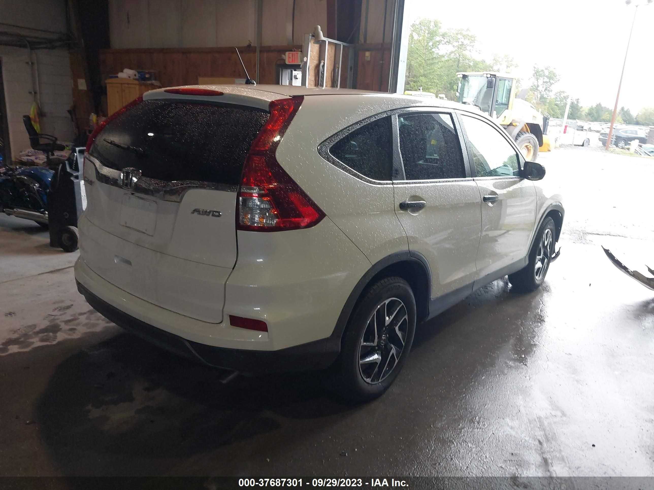 Photo 3 VIN: 5J6RM4H41GL134108 - HONDA CR-V 