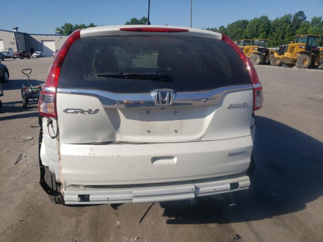 Photo 8 VIN: 5J6RM4H42GL098011 - HONDA CR-V SE 