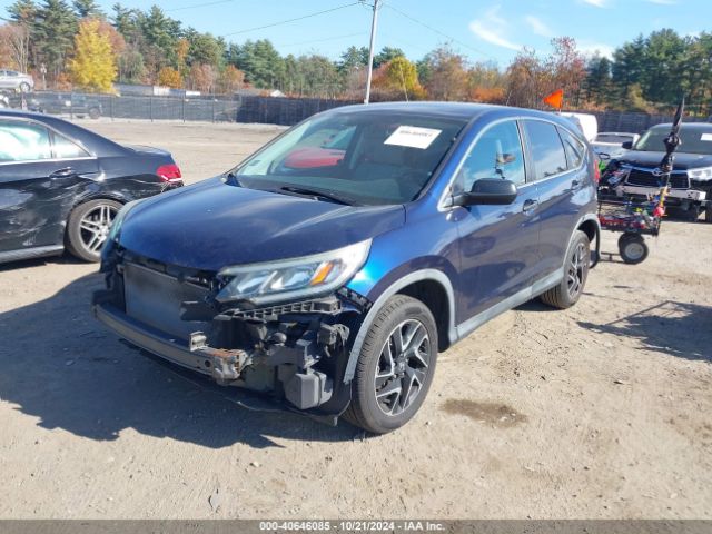 Photo 5 VIN: 5J6RM4H44GL031281 - HONDA CR-V 