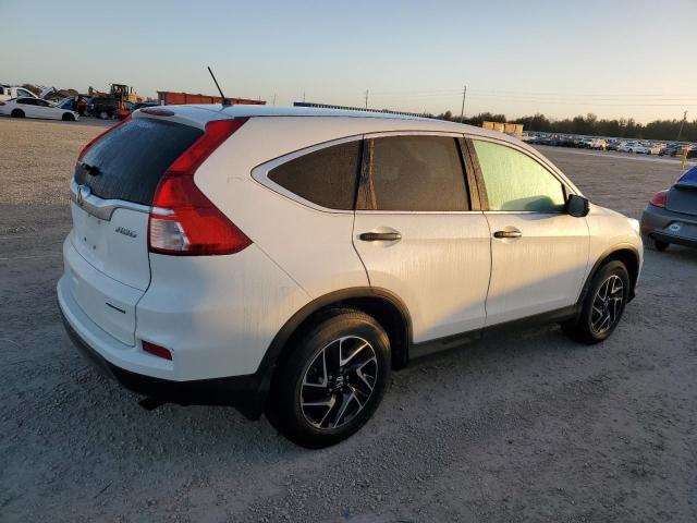 Photo 2 VIN: 5J6RM4H47GL073105 - HONDA CR-V SE 