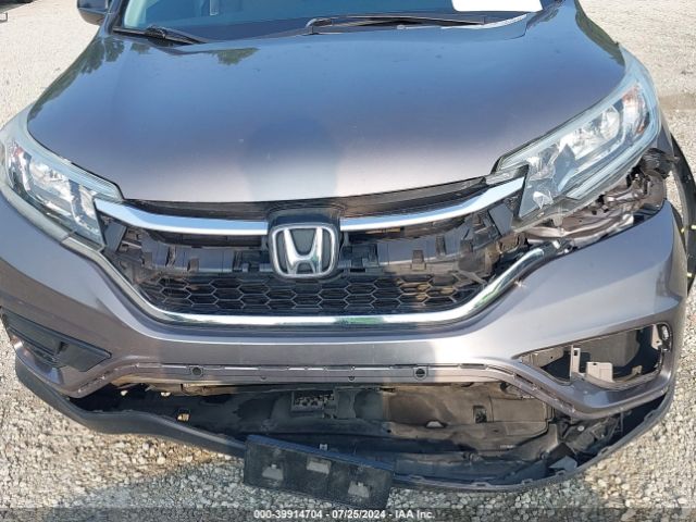 Photo 5 VIN: 5J6RM4H4XGL035450 - HONDA CR-V 