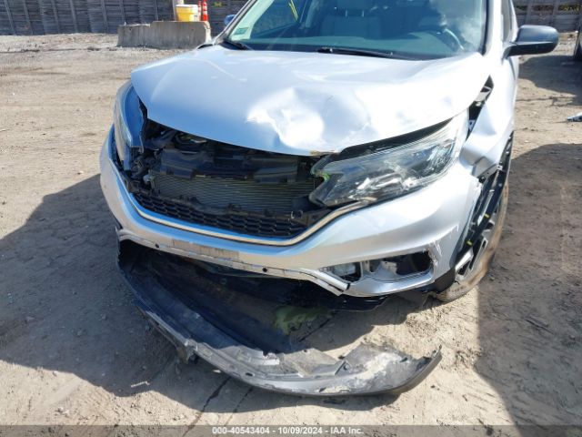 Photo 5 VIN: 5J6RM4H4XGL037991 - HONDA CR-V 