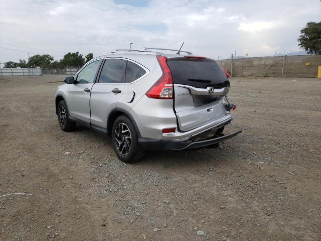 Photo 2 VIN: 5J6RM4H4XGL086897 - HONDA CR-V SE 