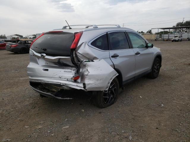 Photo 3 VIN: 5J6RM4H4XGL086897 - HONDA CR-V SE 