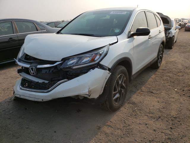 Photo 1 VIN: 5J6RM4H4XGL098032 - HONDA CR-V SE 