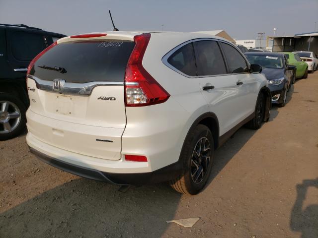 Photo 3 VIN: 5J6RM4H4XGL098032 - HONDA CR-V SE 