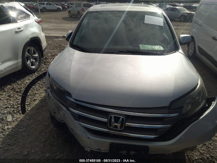 Photo 11 VIN: 5J6RM4H5XCL010311 - HONDA CR-V 