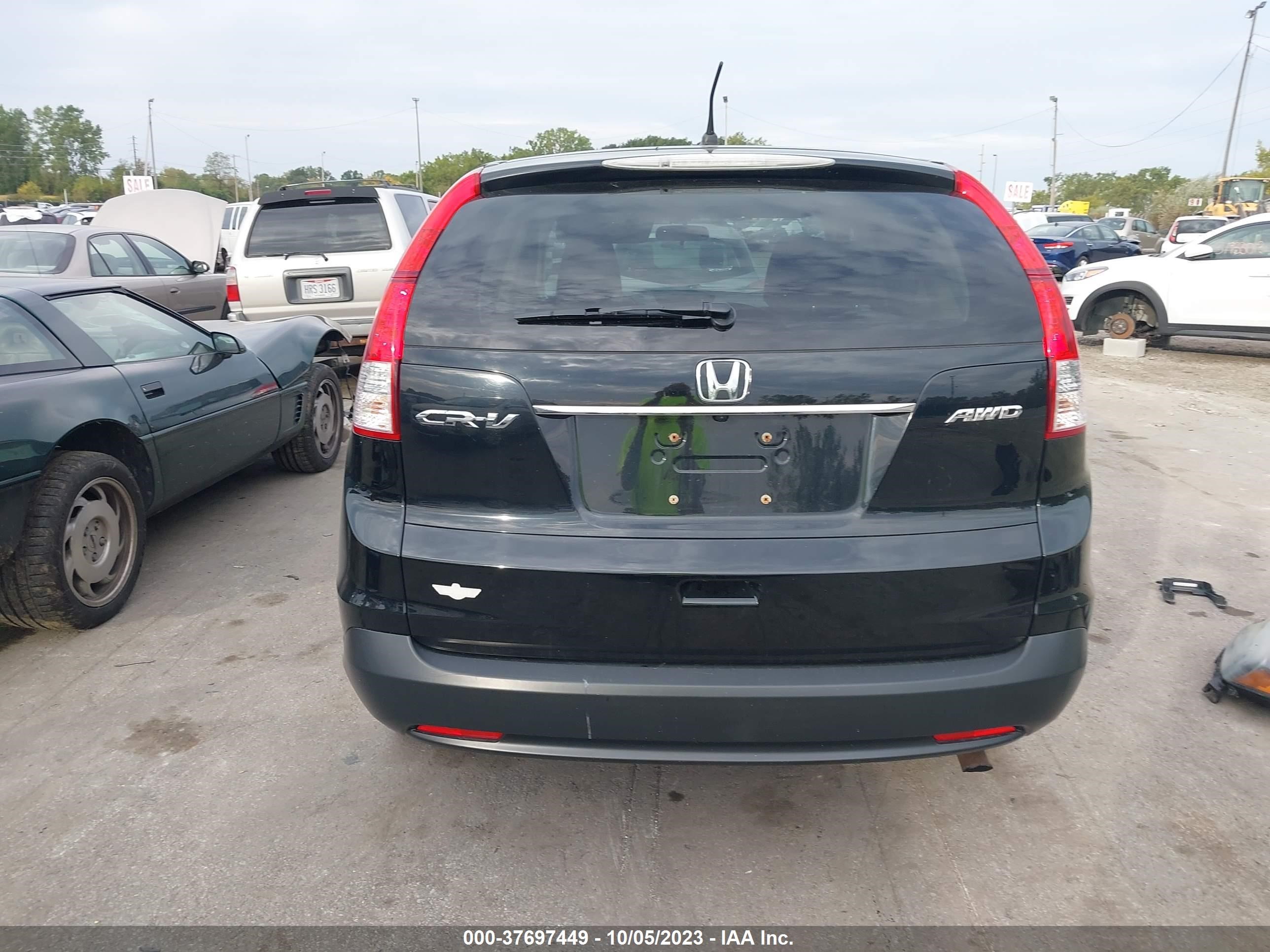 Photo 16 VIN: 5J6RM4H5XCL011104 - HONDA CR-V 