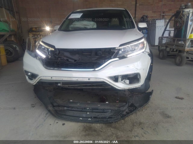 Photo 5 VIN: 5J6RM4H5XGL017409 - HONDA CR-V 