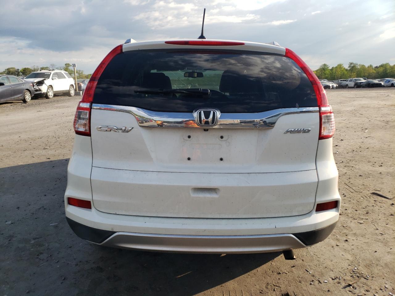 Photo 5 VIN: 5J6RM4H70GL044281 - HONDA CR-V 