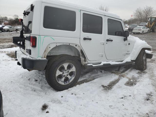 Photo 2 VIN: 5J6RM4H72CL002169 - JEEP WRANGLER 