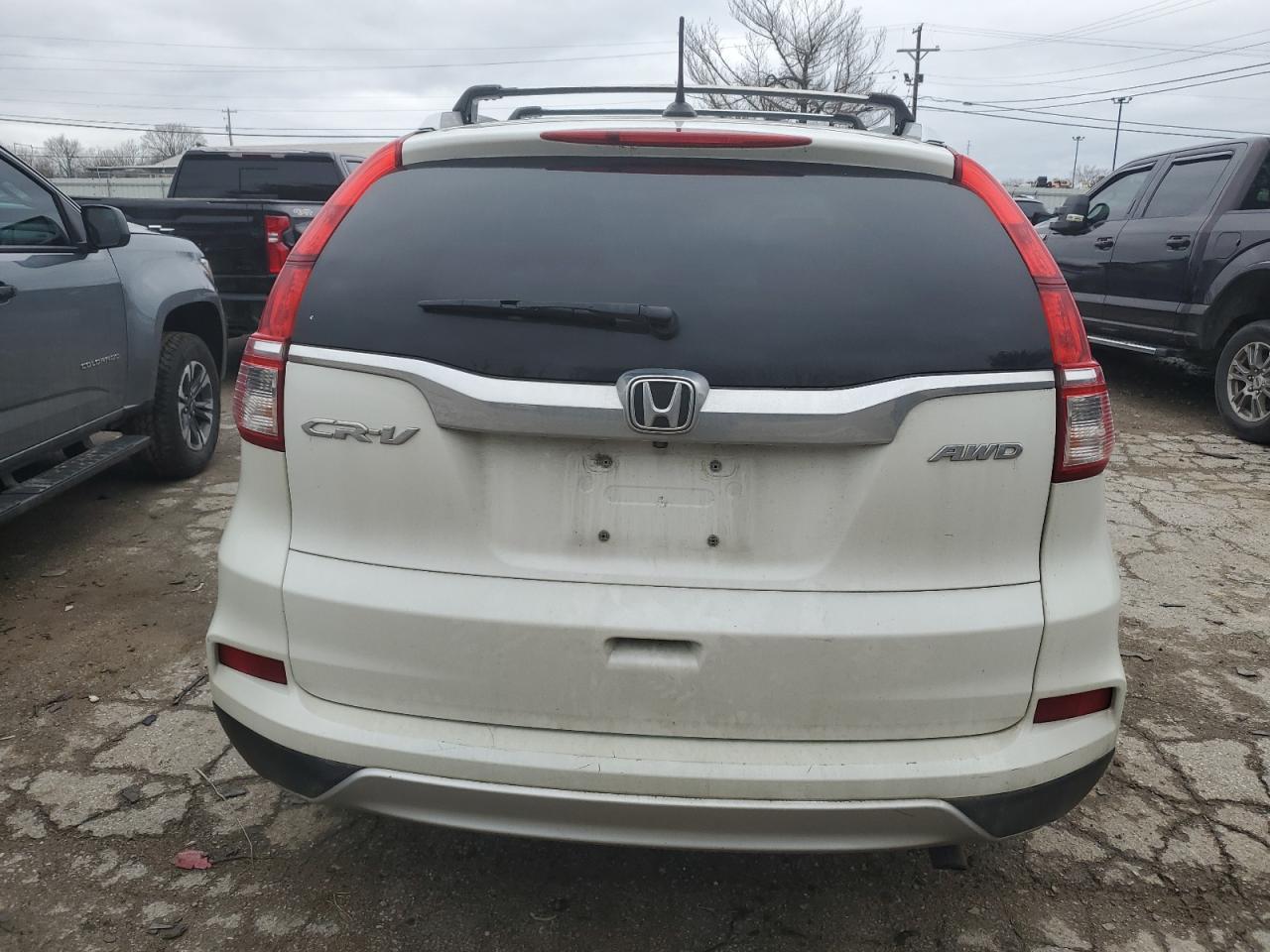 Photo 5 VIN: 5J6RM4H79GL022893 - HONDA CR-V 