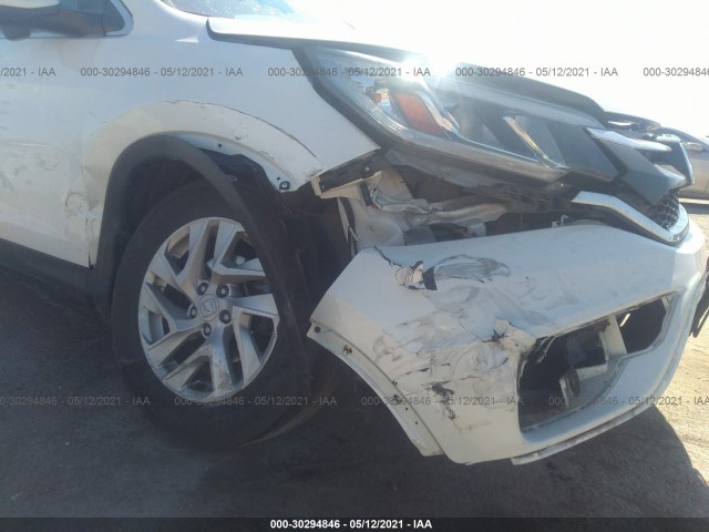 Photo 5 VIN: 5J6RM4H79GL034283 - HONDA CR-V 