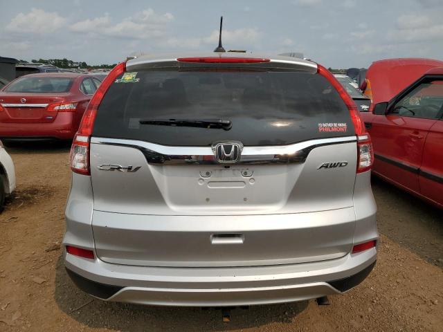 Photo 5 VIN: 5J6RM4H7XGL049486 - HONDA CRV 