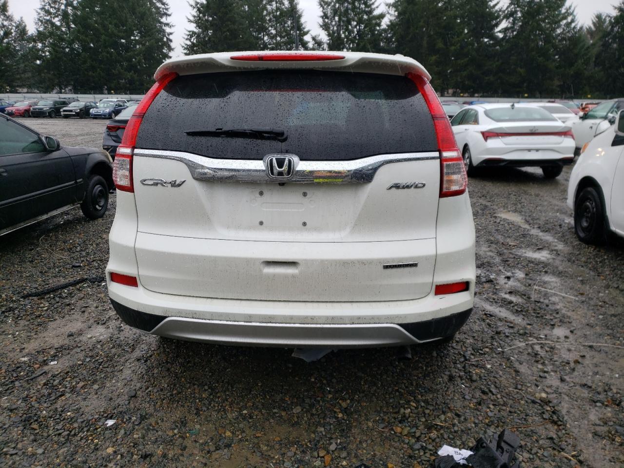 Photo 5 VIN: 5J6RM4H90GL000881 - HONDA CR-V 