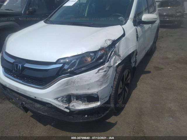 Photo 5 VIN: 5J6RM4H92GL011624 - HONDA CR-V 