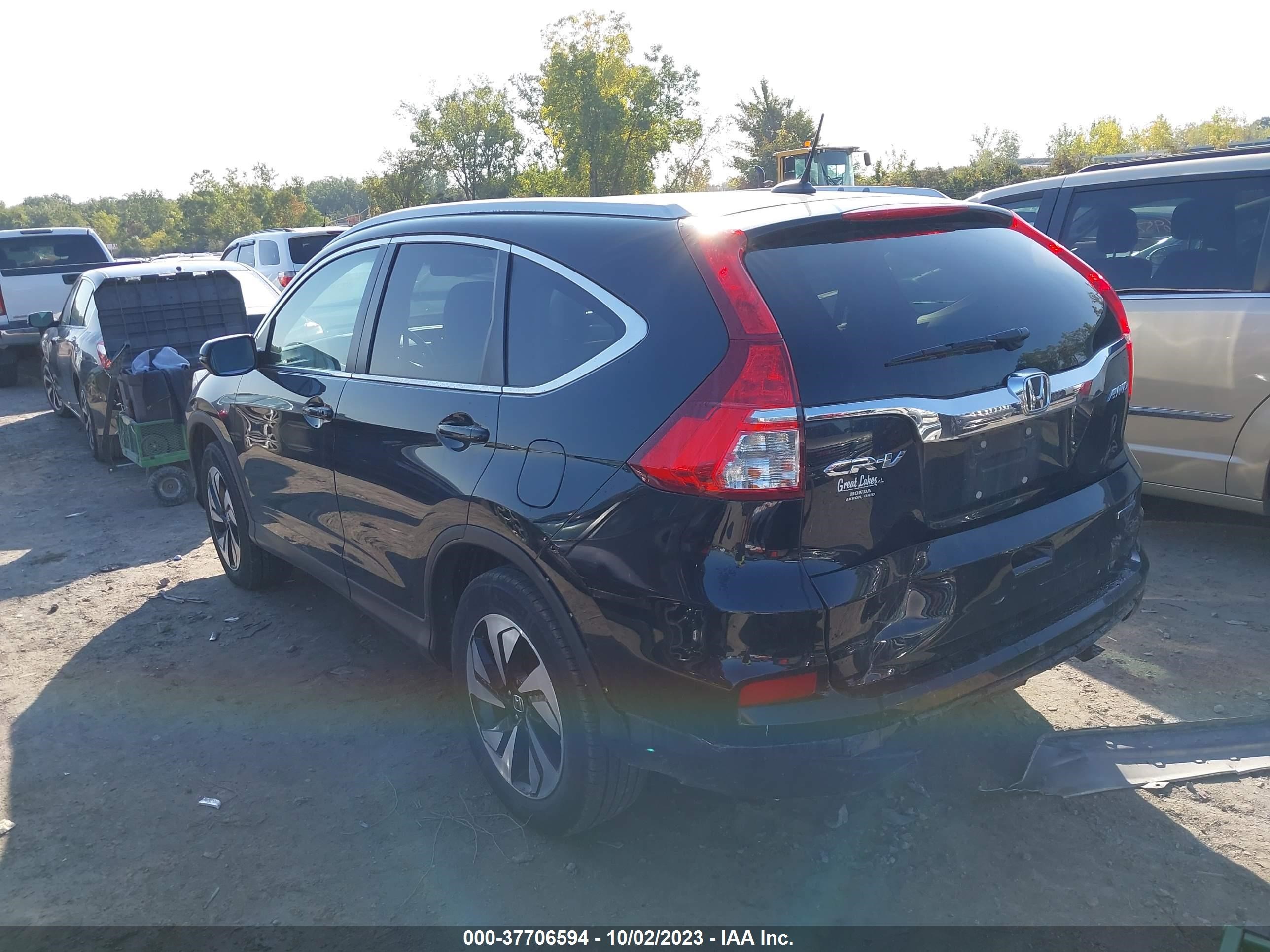 Photo 2 VIN: 5J6RM4H95GL099987 - HONDA CR-V 