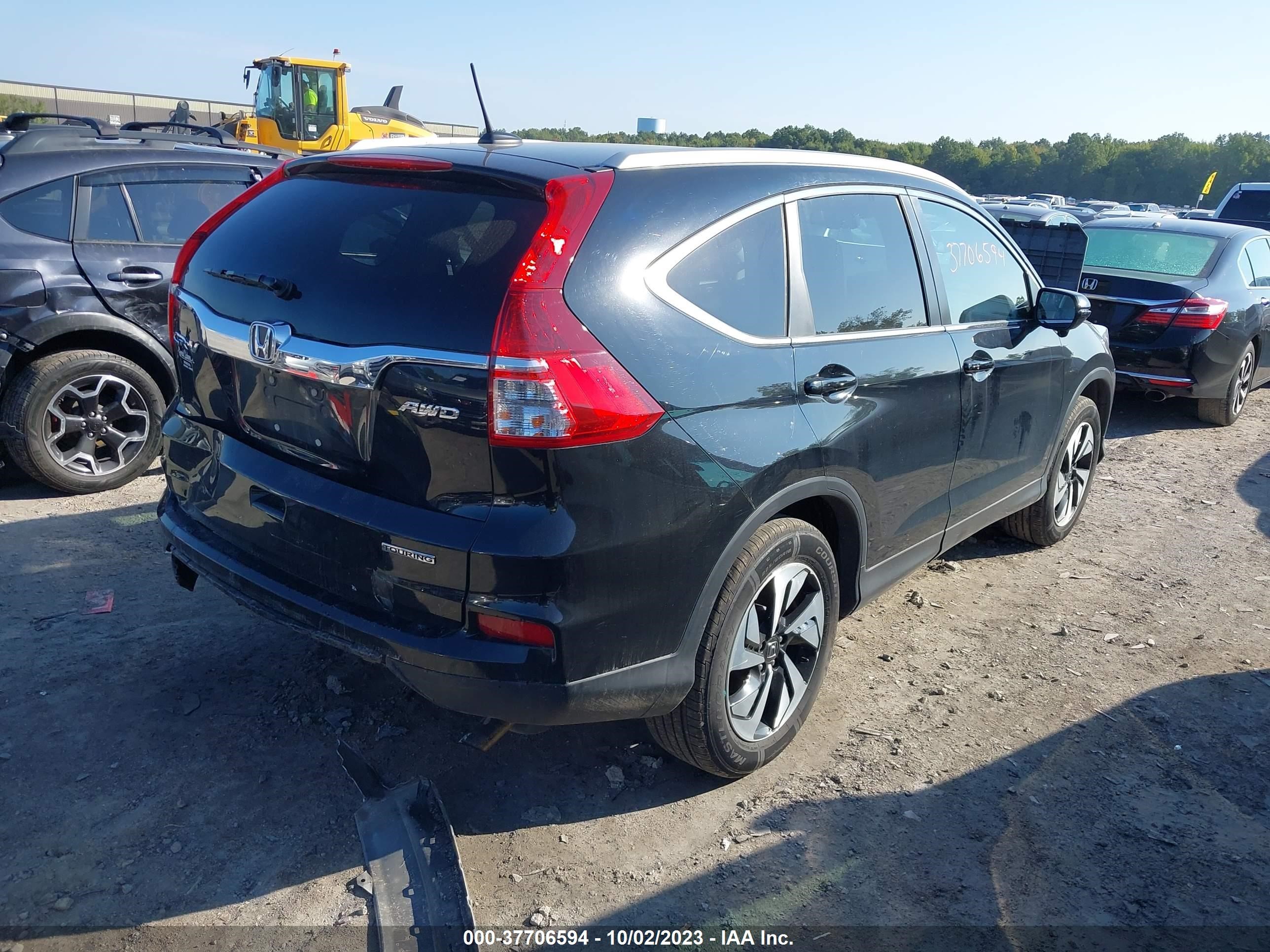 Photo 3 VIN: 5J6RM4H95GL099987 - HONDA CR-V 