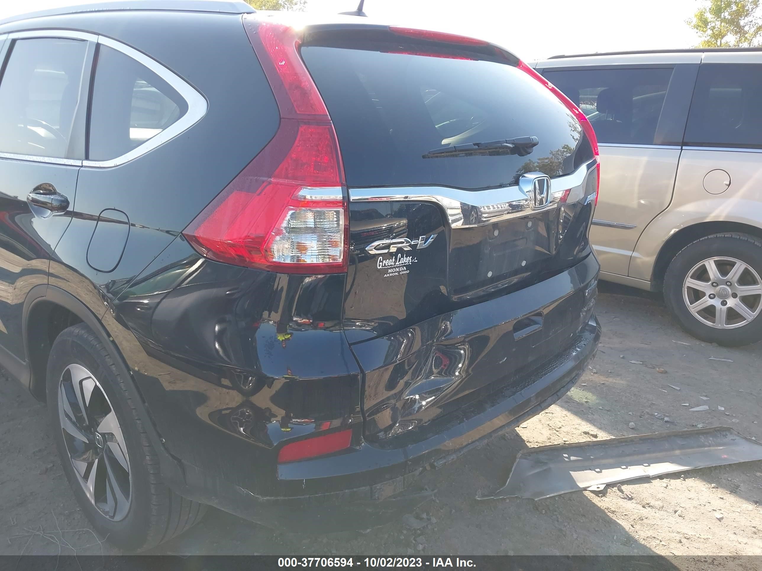 Photo 5 VIN: 5J6RM4H95GL099987 - HONDA CR-V 