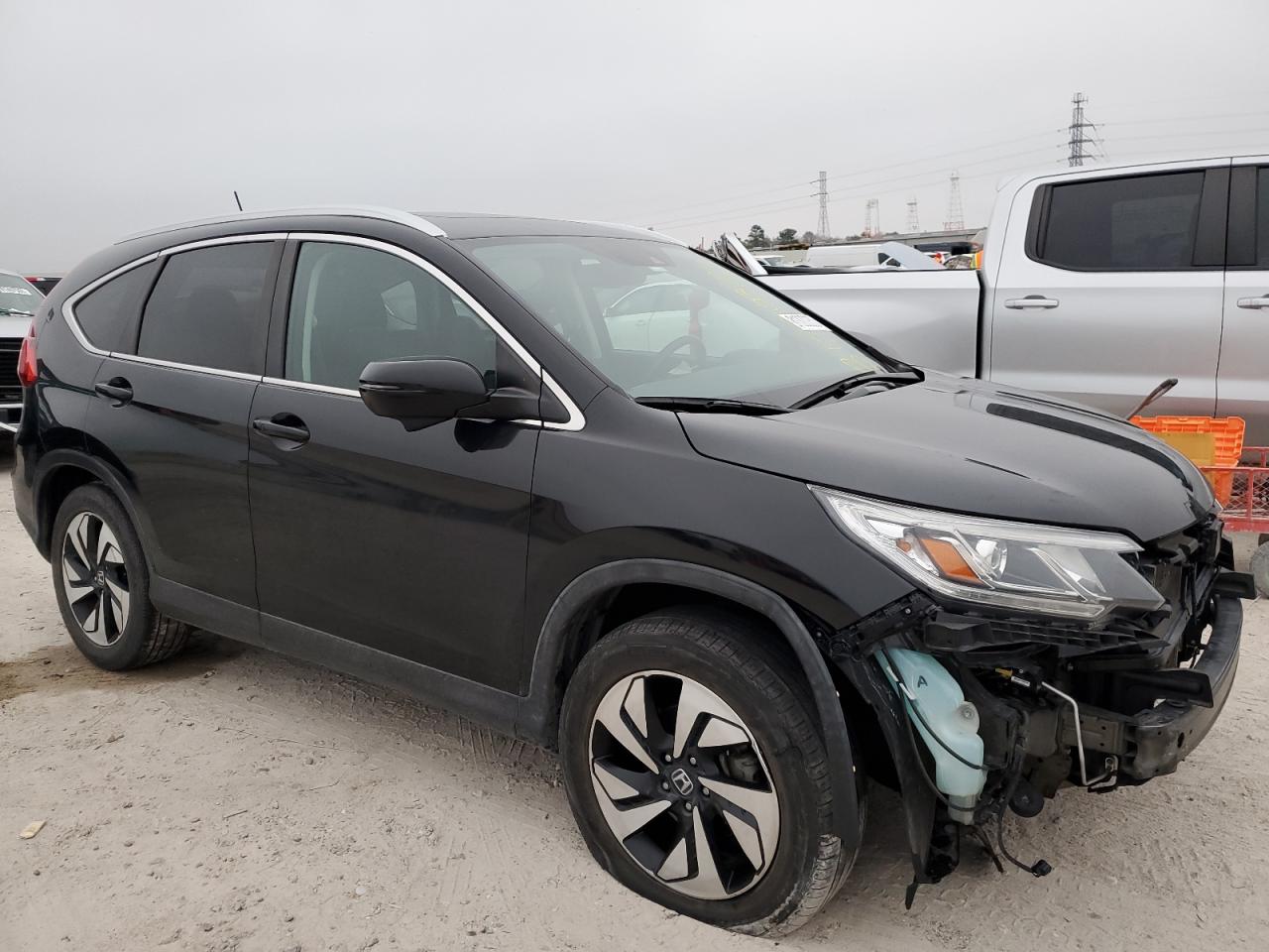 Photo 3 VIN: 5J6RM4H97GL006063 - HONDA CR-V 