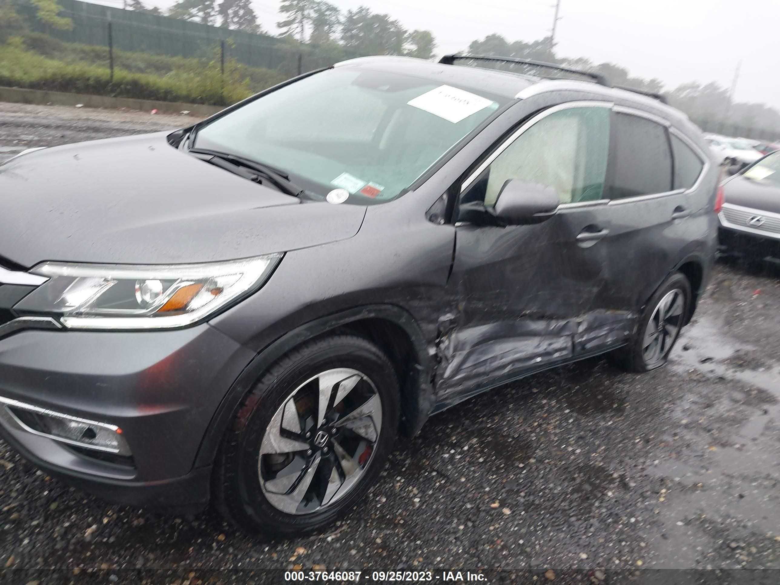 Photo 5 VIN: 5J6RM4H97GL019444 - HONDA CR-V 