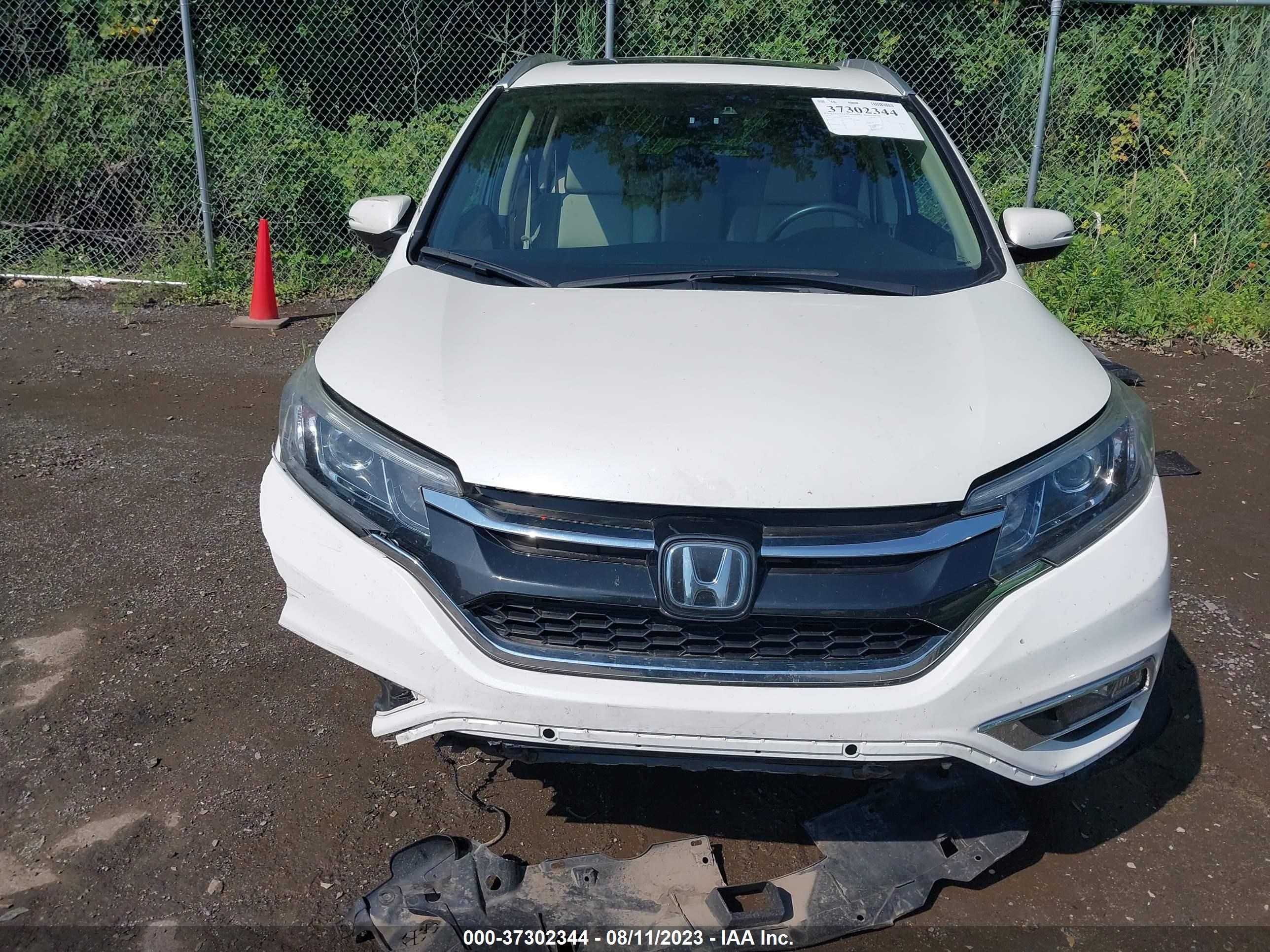 Photo 11 VIN: 5J6RM4H97GL075156 - HONDA CR-V 