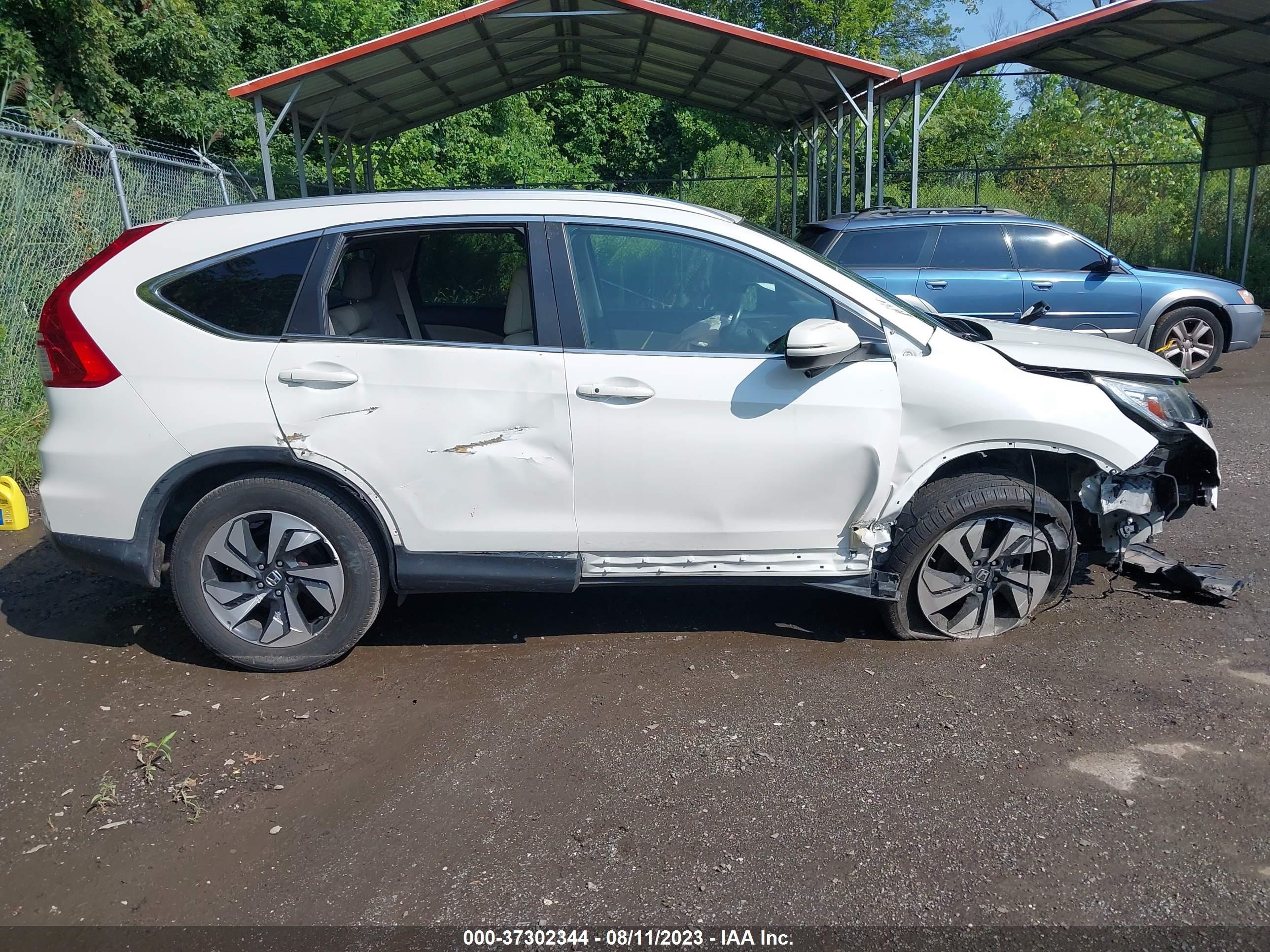 Photo 12 VIN: 5J6RM4H97GL075156 - HONDA CR-V 